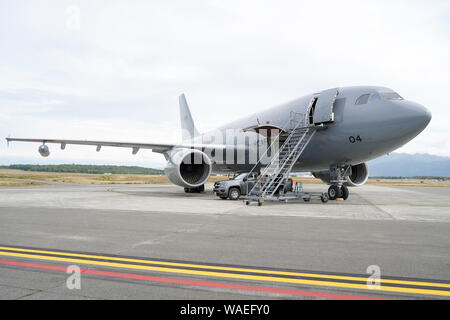 A Royal Canadian Air Force CC-150 Polaris refueling tanker of the 437th Transport Squadron based out of Canadian Forces Base Trenton, Canada, sits on the tarmac at Joint Base Elmendorf-Richardson, Alaska, before a sortie during the Red Flag-Alaska 19-3 exercise, Aug. 15, 2019. Red Flag-Alaska, a series of Pacific Air Forces commander-directed field training exercises for U.S. forces, provides joint offensive counter-air, interdiction, close air support, and large force employment training in a simulated combat environment. (U.S. Air Force photo/Justin Connaher) Stock Photo