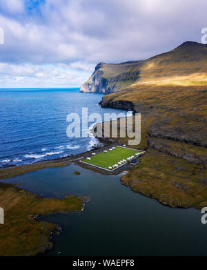 Aerial view of an old football field on the coast near Eidi in Faroe Islands Stock Photo