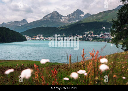 St. Moritz with lake called St. Moritzsee and Swiss Alps in Engadin, Switzerland Stock Photo