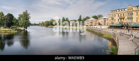 Idyllic view in central Karlstad with the Stadshotell (City Hotel) by the Klarälven river. Varmland, Sweden, Scandinavia. Stock Photo