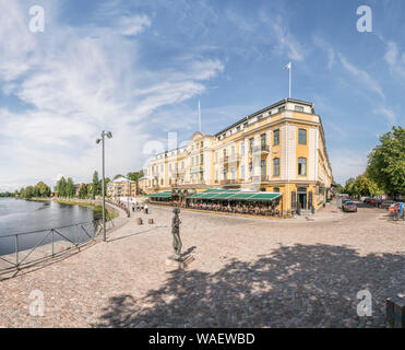 Idyllic view in central Karlstad with the Stadshotell (City Hotel) by the Klarälven river. Varmland, Sweden, Scandinavia. Stock Photo