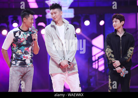 Bai Jingting, right, participates into the Chinese variety show, Dunk of China, in Beijing China, 20 August 2019. Dwyane Wade, an American former professional basketballplayer, shows up at the venue of a Chinese variety show, Dunk of China, with Bai Jingting, a Chinese actor who is basketball lover, in Beijing China, 20 August 2019. Wade and Bai play the roles of coaches in the show and help amateur basketball players. Stock Photo