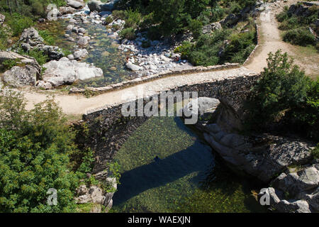 Pont Alzu over the Golo River near Scala di Santa Regina, Regional Natural Park of Corsica, France, July 2018 Stock Photo