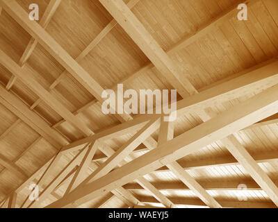 The construction of a wooden roof. Stock Photo