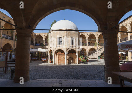 NICOSIA, CYPRUS - MARCH, 29, 2018: Buyuk Han in Nicosia, the biggest caravanserai, Cyprus. Stock Photo