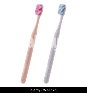 Manual toothbrush set isolated on white background. Toothbrushes in two colours. Blue and pink.