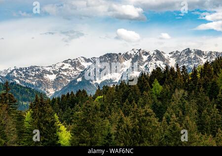 Snow-covered mountain range Zahmer Kaiser seen from the hiking trail to Spitzstein, Erl, Austria Stock Photo