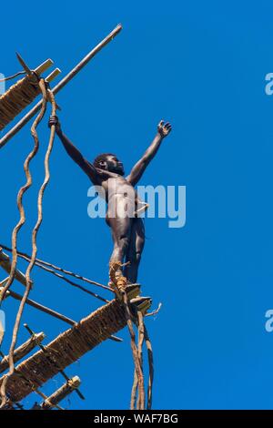 Man jumping from a bamboo tower, Pentecost land diving, Pentecost, Vanuatu Stock Photo