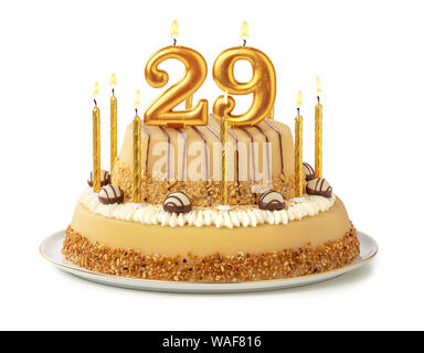 Festive cake with golden candles - Number 29 Stock Photo