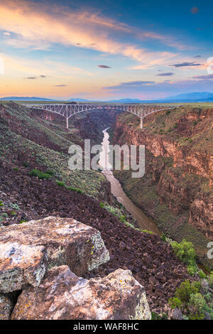 Taos, New Mexico, USA at Rio Grande Gorge Bridge over the Rio Grande at dusk. Stock Photo