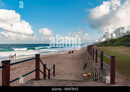 DURBAN, SOUTH AFRICA - AUGUST 14, 2019: People on the beach at Umhlanga Rocks, near Durban, KwaZulu-Natal, South Africa Stock Photo