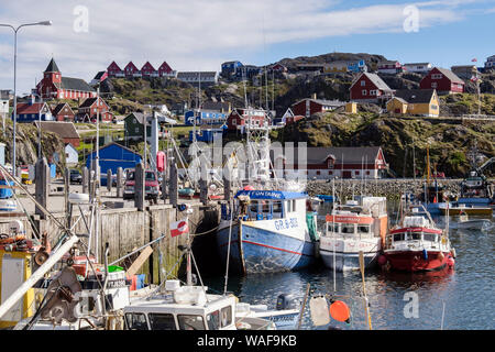 Greenlandic fishing boats moored in the port. Sisimiut (Holsteinsborg), Qeqqata, Greenland. Stock Photo