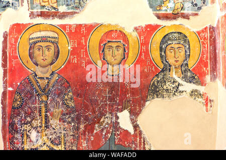 Religious wall paintings inside depicting saints at the 13th-century Panagia tou Moutoulla Church (UNESCO World Heritage Site) in Moutoullas, Cyprus Stock Photo