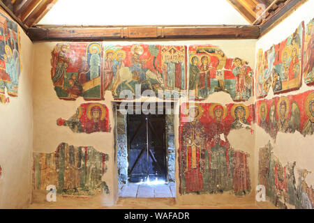 Religious wall paintings inside depicting saints at the 13th-century Panagia tou Moutoulla Church (UNESCO World Heritage Site) in Moutoullas, Cyprus Stock Photo