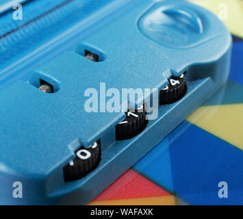 Combination lock on suitcase close-up Stock Photo
