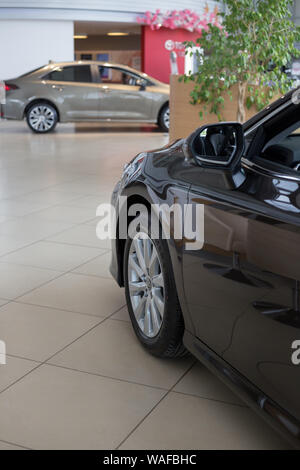 Russia, Izhevsk - July 18, 2019: New cars in the Toyota showroom. Famous world brand. Prestigious vehicles. Stock Photo