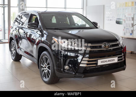 Russia, Izhevsk - July 18, 2019: New cars in the Toyota showroom. Modern Highlander. Famous world brand. Prestigious cars. Stock Photo