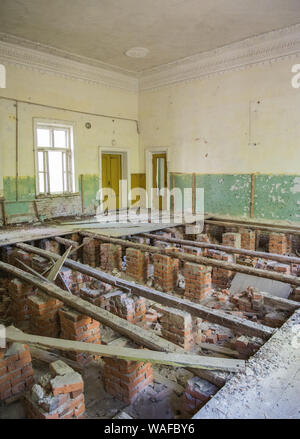 Chernobyl Exclusion Zone - Zarissya Village - Abandoned cultural centre - Rotten floor Stock Photo