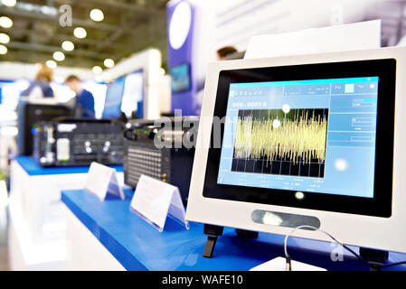 Display of digital multimeter at the exhibition stand Stock Photo