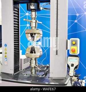 Universal electromechanical testing tensile machine Stock Photo - Alamy