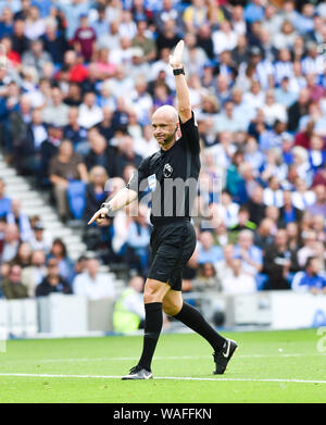 Ref Anthony Taylor during the Premier League match between Brighton and Hove Albion and West Ham United at the American Express Community Stadium , Brighton , 17 August 2019 :  Editorial use only. No merchandising. For Football images FA and Premier League restrictions apply inc. no internet/mobile usage without FAPL license - for details contact Football Dataco