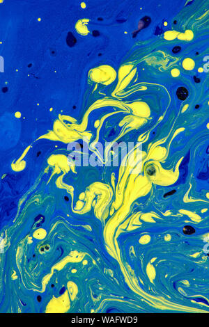 Blue and yellow abstract hand painted background, liquid acrylic painting . Contemporary art concept. Stock Photo