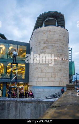 Waverley Court City of Edinburgh council main entrance on East Market Street with sculpture of a Joe Public Stock Photo