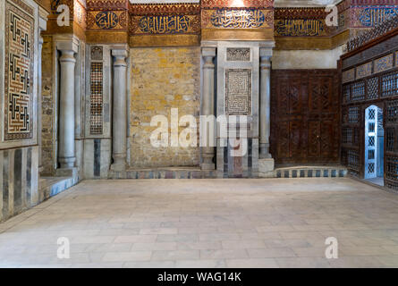 Interior view of decorated marble walls surrounding the cenotaph in the mausoleum of Sultan Qalawun, part of Sultan Qalawun Complex built in 1285 AD, located in Al Moez Street, Old Cairo, Egypt Stock Photo