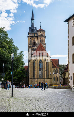 Stuttgart, Germany, August 15, 2019, Cobblestone square schillerplatz surrounding historic church building of stiftskirche also called collegiate chur Stock Photo