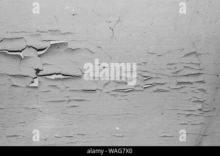 Big wet spots and cracks on the ceiling of the domestic house room after heavy rain and lot of water - Image Stock Photo