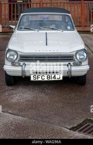 Vintage 1971 White Triumph Herald 13/60 Convertible Saloon Car Black Hood front portrait view classic British sports saloon car nobody Holy Loch Marin Stock Photo