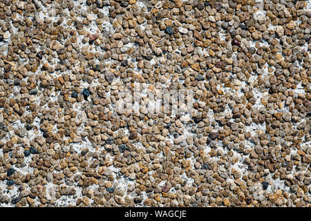 Texture of floor close up orange brown black and gray stones Stock Photo