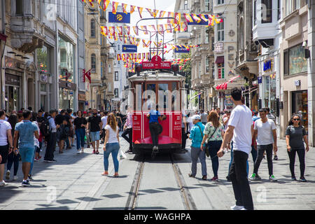 ISTANBUL, TURKEY - JUNE 15, 2019: Unidentified people by Istanbul nostalgic tramways in Istanbul, Turkey. In Istanbul there are are two tramlines with Stock Photo