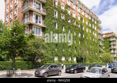 Living wall Paris - Building partly covered with vegetation in the Olympiades district (13th arrondissement) in Paris, France, Europe. Stock Photo