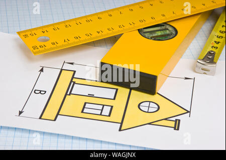 development drawings and tools on graph paper Stock Photo