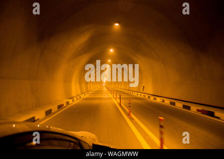 Road tunnel at night view stock photo, highway road tunnel, space for text Stock Photo