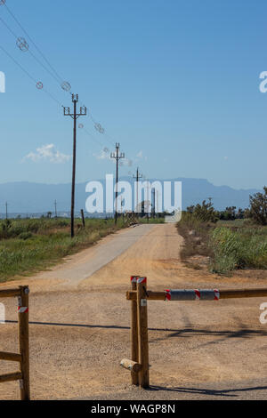 Power line poles in countryside Stock Photo