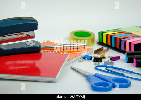 In this photo you can see a lot of school supplies in different positions and on different surfaces. This photo was taken in June 2019 in my house. Stock Photo