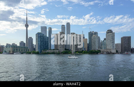 Toronto Harbour and ferry to the Toronto Island as well as CN tower, Toronto, Ontario, Canada, North America, Lake Ontario Stock Photo