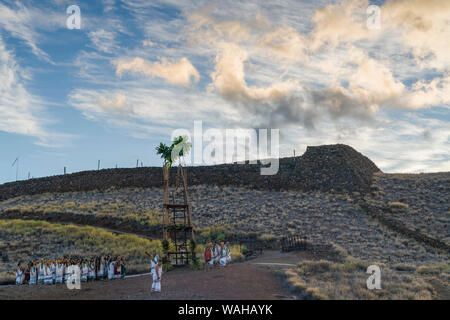 Assembly at Pu'ukohala Heiau NP in Hawaii at dawn for Cultural Ceremony. Stock Photo