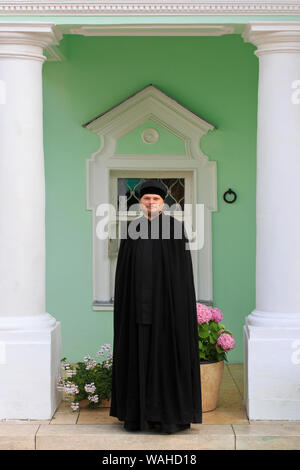 A young Russian Eastern Orthodox priest at the Trinity Lavra of St. Sergius (1345) in Sergiyev Posad, Russia Stock Photo