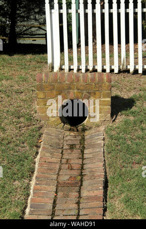 Ground gutter for water drainage in the historical Yorktown, VA, USA Stock Photo