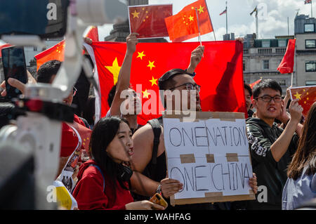London, United Kingdom - August 17,  2019: Chinese citizens in opposition of the UK Solidarity with Hong Kong Rally. Stock Photo