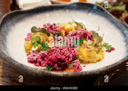 Simple beetroot appetizer cooked in modern way with liquid nitrogen, molecular cuisine Stock Photo