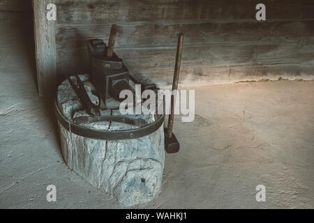 Antique smithy. Retro blacksmithing tools. Stock Photo
