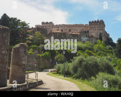 Castle of Caetani family and old medieval houses in small, ancient town Sermoneta, province of Latina, Lazio region, central Italy. Tourism concept. Stock Photo