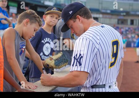 Trenton, New Jersey, USA. 20th Aug, 2019. TREVOR LANE, a pitcher for the Trenton Thunder, signs autographs for fans at ARM & HAMMER Park before a game here vs. the New Hampshire Fisher Cats. Credit: Staton Rabin/ZUMA Wire/Alamy Live News Stock Photo