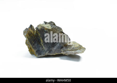 Axinite Crystal with quartz isolated on white background, locality, Pakistan. Stock Photo