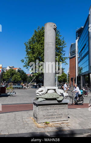 The memorial obelisk near the Rembrandt House Museum indicating the limit of old city in Amsterdam Stock Photo