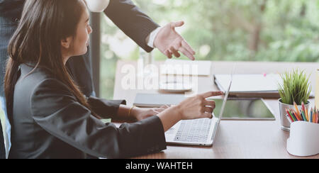 Professional business team discussing the plan together for the upcoming project Stock Photo